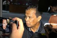 Pemilik Maktour Travel, Fuad Hasan Masyhur di Gedung Merah Putih KPK.